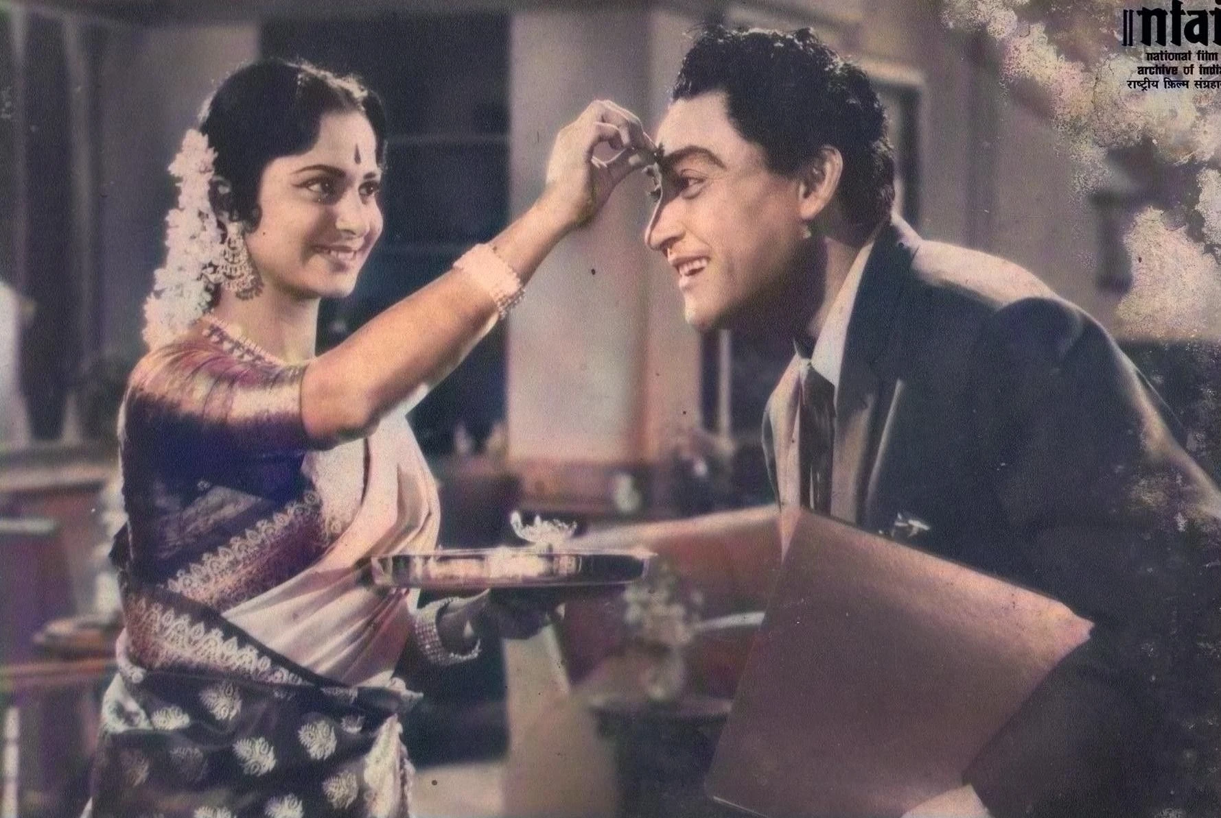 Ashok Kumar and Waheeda Rehman